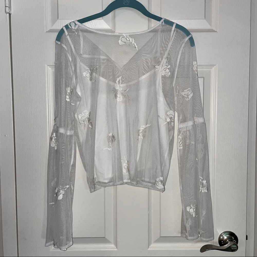 Sheer lace over cami top